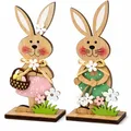 Produktbild: Deggelbam 2er Set Holz Osterhasen Aufsteller (19 cm) – lasergeschnittene Osterdeko & Frühlingsdeko im Naturlook – Tischdeko Ostern für Ostertisch, Fensterbank, Regal & Wohnzimmer