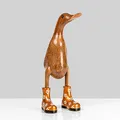 Produktbild: Rikmani - Holzfigur Ente Stiefel Gold GEBLÜMT 100% Natur Original - Handgefertigte Figur aus Holz 26 cm