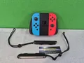 Produktbild: Nintendo Switch Joy-Con Controllers Pair Neon-Rot Neon-Blau + JoyCon Grip