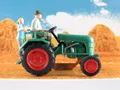 Produktbild: Busch 40072 Traktor Kramer KL 11 (1953) mit Bauer und Kind 1:87/H0 NEU/OVP