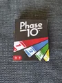 Produktbild: Mattel Phase 10 Kartenspiel Gesellschaftsspiel Familienspiel 2-6 Spieler