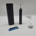 Produktbild: Oral-B Genius X Midnight Black mit Reiseetui, Schwarz - Deutliche Gebrauchsspure
