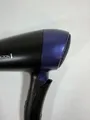 Produktbild: Remington Reise-Haartrockner D2400 klappbar 1400W schwarz-lila
