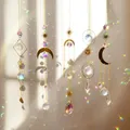 Produktbild: nuyikaso 5 Stück Sonnenfänger Kristall Hanging Windspiel Regenbogen Sonnen Mond Anhänger Kristalle Ornament Kristallkugeln für Fenster Haus Garten Weihnachten Tag Party Hochzeit Dekoration