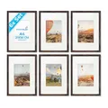 Produktbild: PHOTOLINI Bilderrahmen A4 Holz MDF Eiche Dunkel, 6er Set DIN A4 Bilderrahmen 21x30 cm mit Passepartout, Acrylglas, picture frame zum Aufhängen & Aufstellen, Rahmen mit Zubehör 30x21 für Fotos, Poster