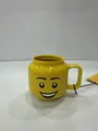 Produktbild: LEGO Kaffeetasse HAPPY BOY 255 ml gelb im Karton aus Keramik
