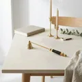 Produktbild: Kerzenlöscher Messing, gold glänzend, langer Stiel schwarz, L.28 cm
