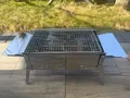Produktbild: Klappbarer Camping Grill aus Edelstahl 0,6 mm 67x25x32 cm Mangal BBQ