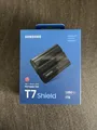 Produktbild: Samsung Portable SSD T7 Shield, 1 TB, USB 3.2 Gen.2 externe Festplatte Schwarz