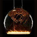 Produktbild: LED Lampe Floating Globe R150 Twisted, E27, 8W, 1900K, warmweiß, extra dimmbar,