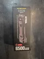 Produktbild: Nitecore EDC29 - LED Taschenlampe 6500 Lumen Spot & Flutlicht USB-C OLED Display