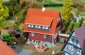 Produktbild: Faller 130587 Spur H0 - Fachwerkhaus mit Brunnen  NEU und OVP
