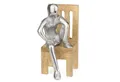 Produktbild: Moritz Skulptur Mann auf Stuhl silber 13 cm, Holz, Tischdeko, Fensterdeko, Wanddeko, Holzdeko, Weihnachtsdeko
