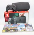 Produktbild: Nintendo Switch -32GB -HAC-001 -Spielekonsole -Grau + 4 Spiele &Pro Cont.&Tasche