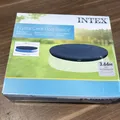 Produktbild: Intex 28022, Kristall Clear Pool Basics, Poolabdeckung Abdeckplane Ø 366 cm