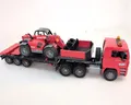 Produktbild: Bruder MAN TGA Tieflader mit Manitou Teleskoplader Modell Baufahrzeug - Gut