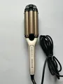 Produktbild: Remington Welleneisen ProLuxe 4-in-1 Lockenstab