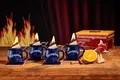 Produktbild: Feuerzangentasse Bowle-Set Feuerzangentasse 4er-Set (Feuerzangenbowle Set, 9-tlg., 4x Feuerzangentasse, 4x Korkuntersetzer, 1x Rezeptheftchen), hitzebeständige Keramik, Edelstahl-Feuerzange