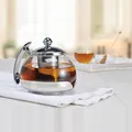 Produktbild: Elegante Tee-Kanne Teekanne aus hitzebeständigem Glas mit Edelstahlhalter 1,2 L