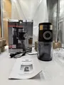 Produktbild: ROMMELSBACHER Kaffeemühle EKM 200 110W Schwarz + Melitta Permanent Kaffeefilter