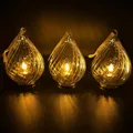Produktbild: 3er Set LED Teelichter in einem Glastropfen gold Timer Weihnachtsdeko zum Hängen