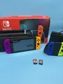 Produktbild: Nintendo Switch Konsole  4 Joy-Con + Pokémon Schild + Mario & Sonic