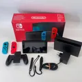 Produktbild: Nintendo Switch Konsole mit Joy-Con - Neon-Rot/Neon-Blau in OVP !