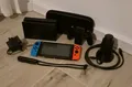 Produktbild: Nintendo Switch Konsole V2 32GB HAC-001(-01) - Joy-Cons Neon-Rot/Neon-Blau