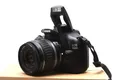 Produktbild: Canon EOS 1100D 12,2 MP FULL HD DSLR mit Canon EF-S 18-55mm II Objektiv + Zub