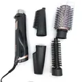 Produktbild: Babyliss AS200E Rotierende ionische Haarbürste mit 4 Köpfen zum Föhnen  - Defekt