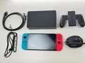 Produktbild: Nintendo Switch OLED Modell blau/rot ohne OVP | Guter Zustand
