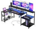 Produktbild: Bestier Gaming Tisch, 181x80 cm Schreibtisch mit LED-Leuchten, L-förmiger Schreibtische mit 3 AC-Steckdosen und 2 USB Ladeanschluss, Computertisch mit großzügiger Monitorablage, Kohlefaser