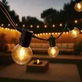 Produktbild: Ledvion - Lichterkette, 30M, 50x E12 LED Lampe, wasserdicht IP44, 15W, 2700K, Außenlichterkette - Schwarz