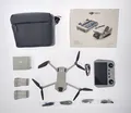 Produktbild: DJI Mini 3 Fly More Combo Kameradrohne (mit RC Fernsteuerung) MwSt. #C470