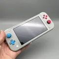 Produktbild: Nintendo Switch Lite Pokémon EDT - Zacian & Zamazenta | Handheld-Spielekonsole