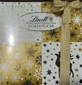 Produktbild: Lindt Schokolade Goldstücke Pralinésmix Premium Pralinen 4 x 300g