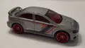 Produktbild: HOT WHEELS MITSUBISHI LANCER EVOLUTION X AUS 5-PACK NIGHTBURNERZ FKT55