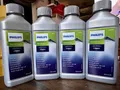 Produktbild: Spezieller Entkalker für Espressomaschinen PHILIPS  mit 4 Flaschen à 250 ml