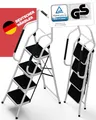 Produktbild: Sicherheitsleiter 4 Stufen Klappbar I TÜV Rheinland Zertifiziert I Belastbar bis 150kg I Anti-Rutsch-Füße und Trittstufen I Trittleiter mit Handlauf I Sicherheitsleiter für Senioren I Weiß