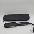 Produktbild: Remington Glätteisen [extra breite Keramikstylingplatten 110 x 50mm] Proluxe (OP