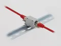 Produktbild: Delock RJ45 Kupplung Cat.6A Buchse zu mit Staubschutzklappe für Hutschienen Montage (90768)