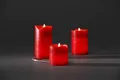 Produktbild: Konstsmide - LED Echtwachskerzen 3er-Set, rot, zerlaufene Wachsoptik, 6, 5 - 12, 5 cm, 6 warm weiß flackernde Dioden, 3V Innentrafo, transparentes Kabel ; 1968-550