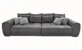 Produktbild: luma-home Big-Sofa 15114, XXL-Couch B306/T134/H86 cm, Liegefläche 120x240 cm, mit Federkernpolsterung, viele Kissen, markante Steppungen, Mikrofaserstoff Grau