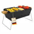 Produktbild: Mobiler Holzkohlegrill BBQ-Gril aus Edelstahl; Tragbarer Camping Grill & Feuerschale für 2–5 Personen; MADE IN GERMANY; inkl. 2 Roste für Fleisch & Gemüse; für Balkon Festival Garten Outdoor