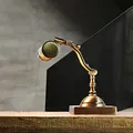 Produktbild: Licht-Erlebnisse Bankerleuchte Echt-Messing in Bronze glänzend Büro Arbeitszimmer H:26 cm E14 Handarbeit Vintage schwenkbare Tischlampe Wohnzimmer