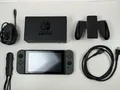 Produktbild: Nintendo Switch Spielekonsole v2 mit OVP - grau | vollständig ✅