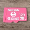 Produktbild: Verkaufsanzeige – SanDisk microSDXC 128GB Nintendo Switch Pilz-Motiv Super Mari0