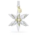Produktbild: Swarovski Annual Edition 3D Ornament 2025, Klarer Kristallstern mit 393 Facetten, Champagner-goldfarbenem Metallkern und Weißem Ripsband, Größe: 6.1 x 4.6 x 4.6 cm