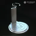 Produktbild: Legendari Actionfiguren-Ständer mit MetaTravelers Logo