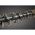 Produktbild: Konstsmide Micro LED Büschellichterkette Cluster, Multifunktion, Timer/Dimmer, reagiert auf Musik, Appgesteuert (Android/IOS), 960 bernsteinfarbene Dioden, 36V Außentrafo, schwarzes Kabel - 6563-870